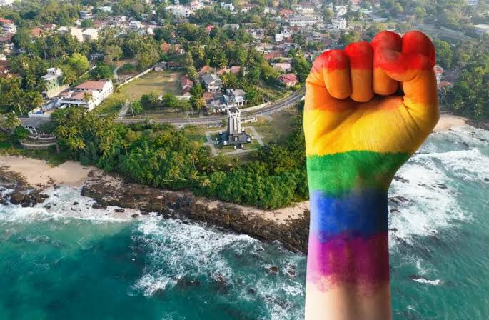 Local LGBTQ+ community member welcoming travelers at Sri Lankan beach location