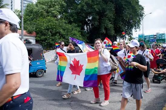 LGBTQ+ community gathering in Colombo Sri Lanka with rainbow decorations and inclusive atmosphere
