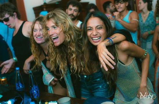 Intimate LGBTQ+ celebration event at private venue in Sri Lanka with rainbow lighting