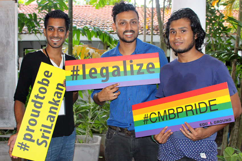 Smartphone showing LGBTQ+ travel app with Sri Lankan destinations and community connections